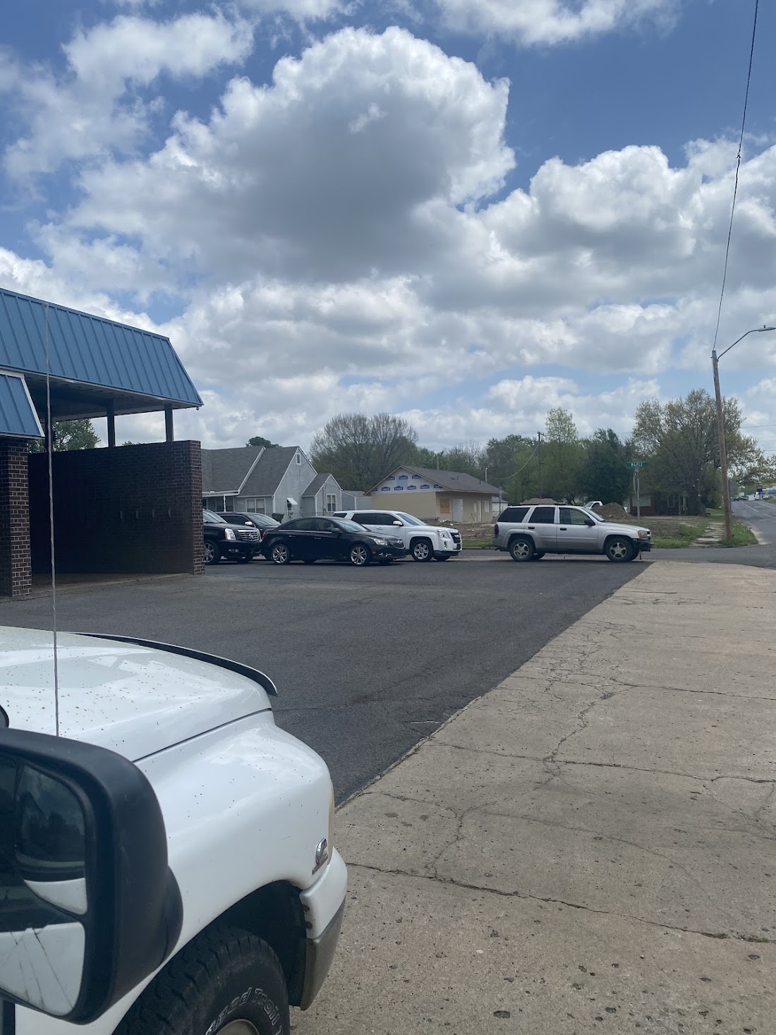 Service area and lot at Armstrong Automotive Repair